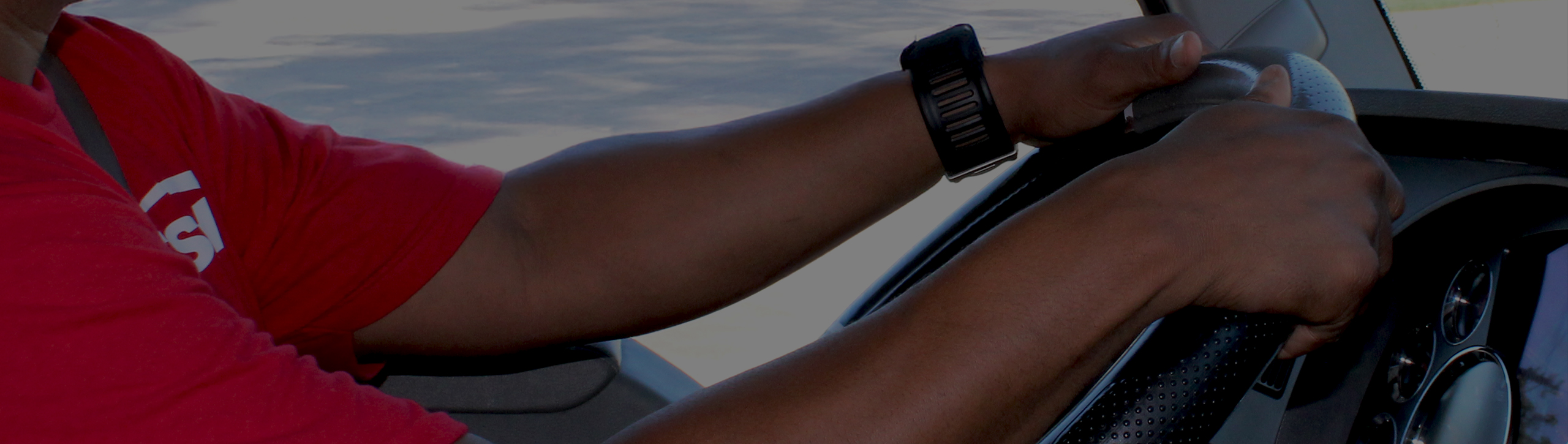 Closeup of TSH driver behind the wheel