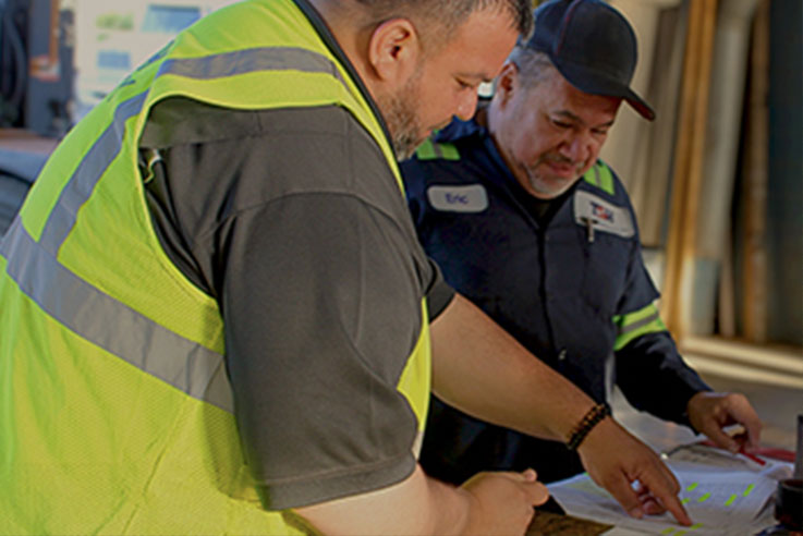 TSH employee wearing safety vest